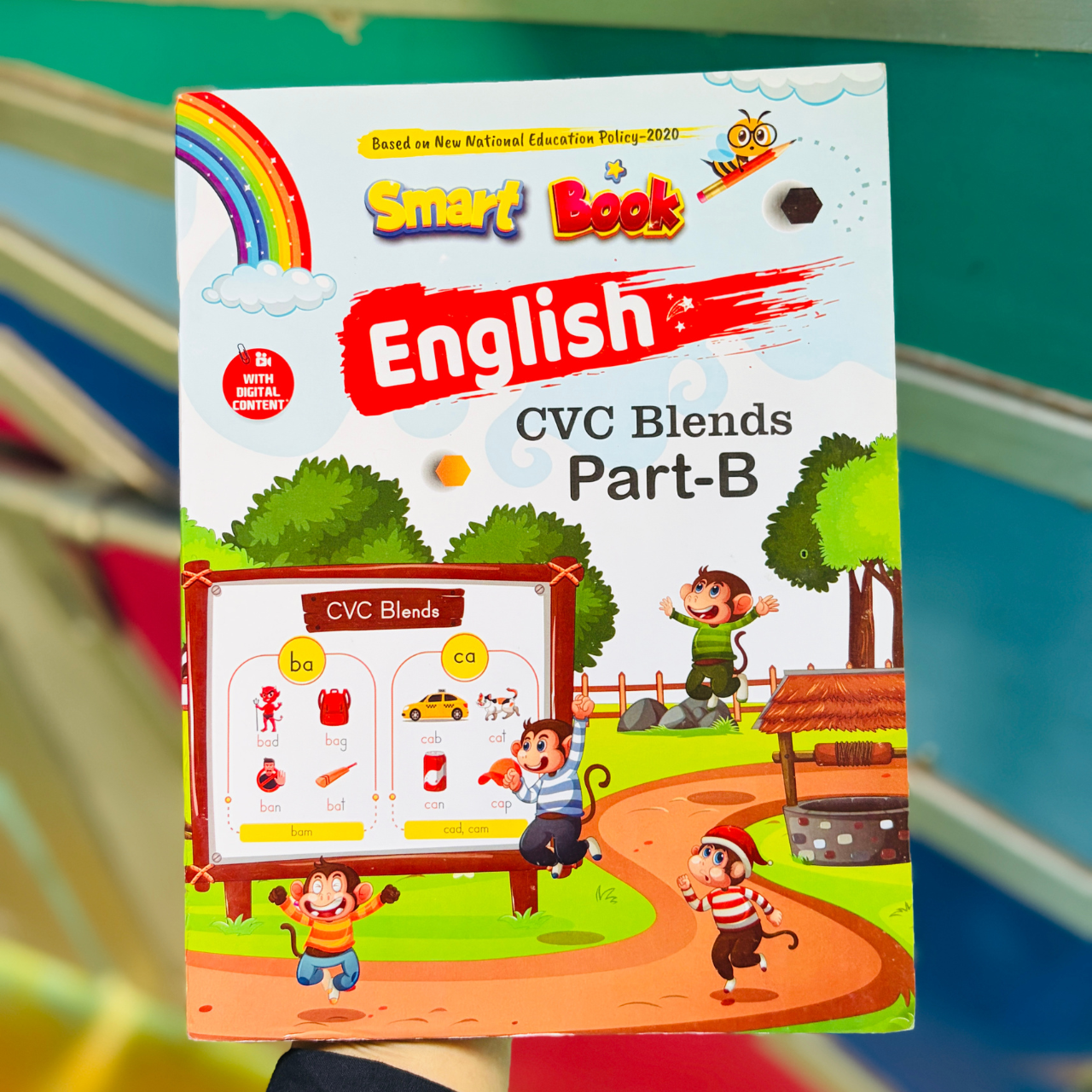 Kenbee Smart Book English CVC Blends Part-B printed physical book cover held by a user.